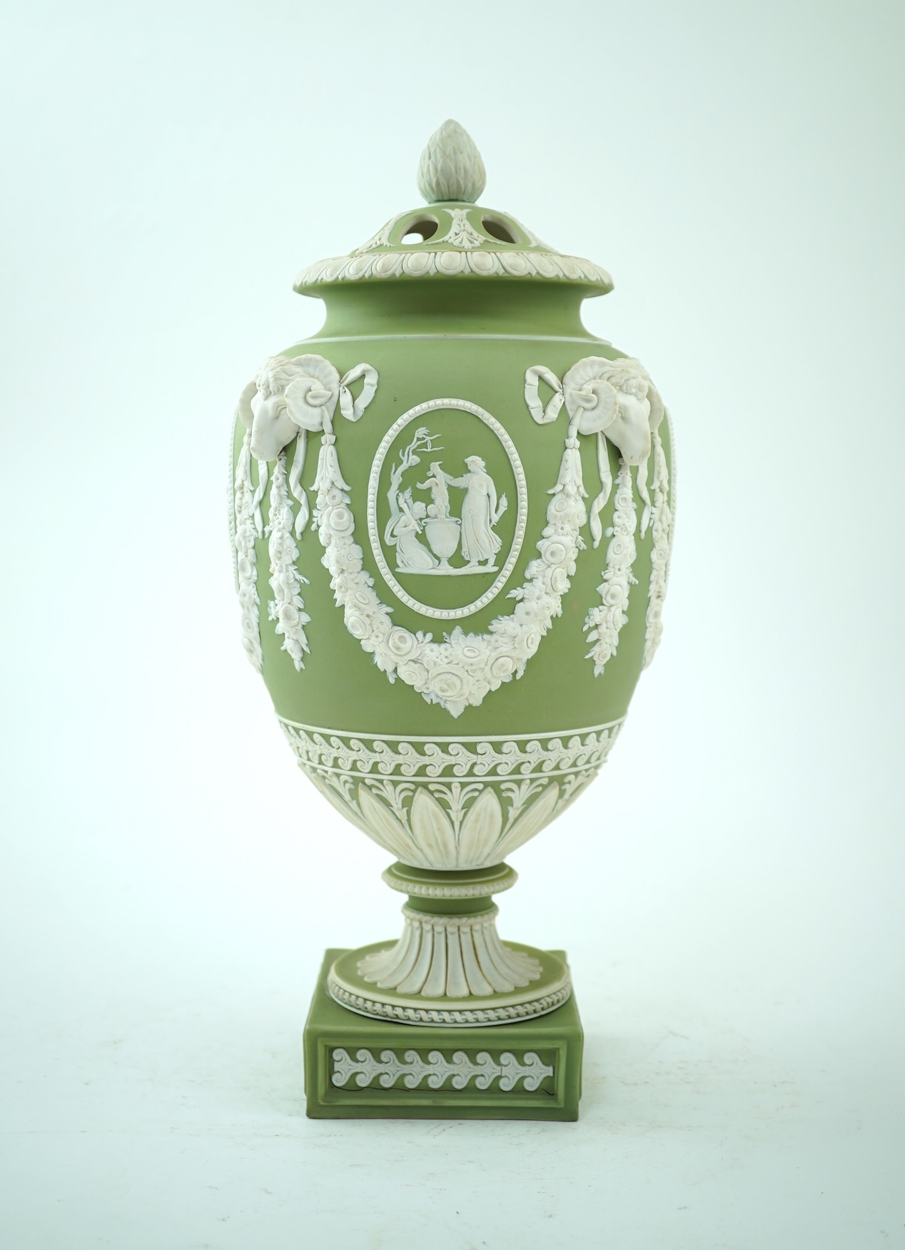 A Wedgwood green jasperware covered pot pourri urn, early 19th century
